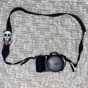 Black Nikon coolpix digital camera